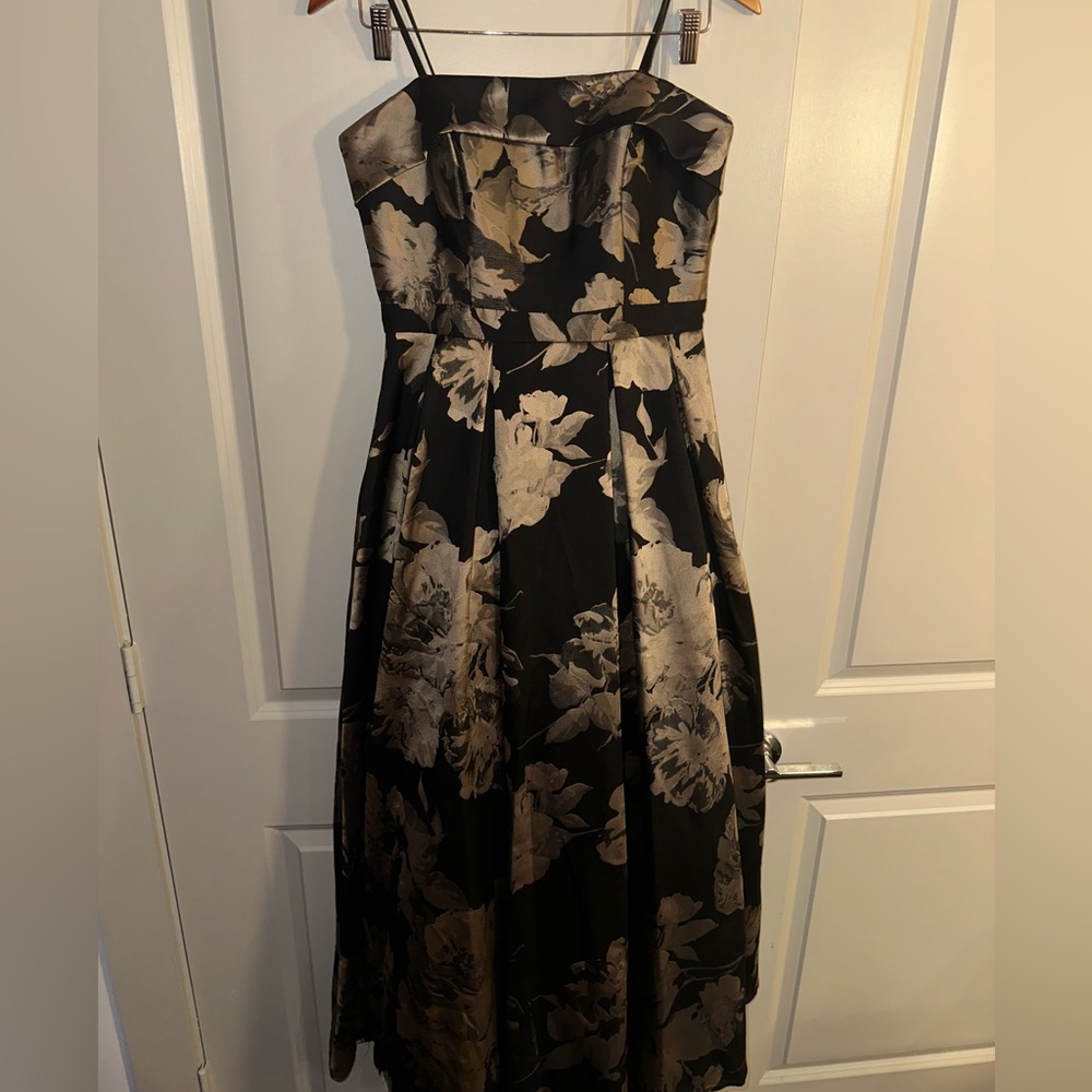 Xscape gold and black gown